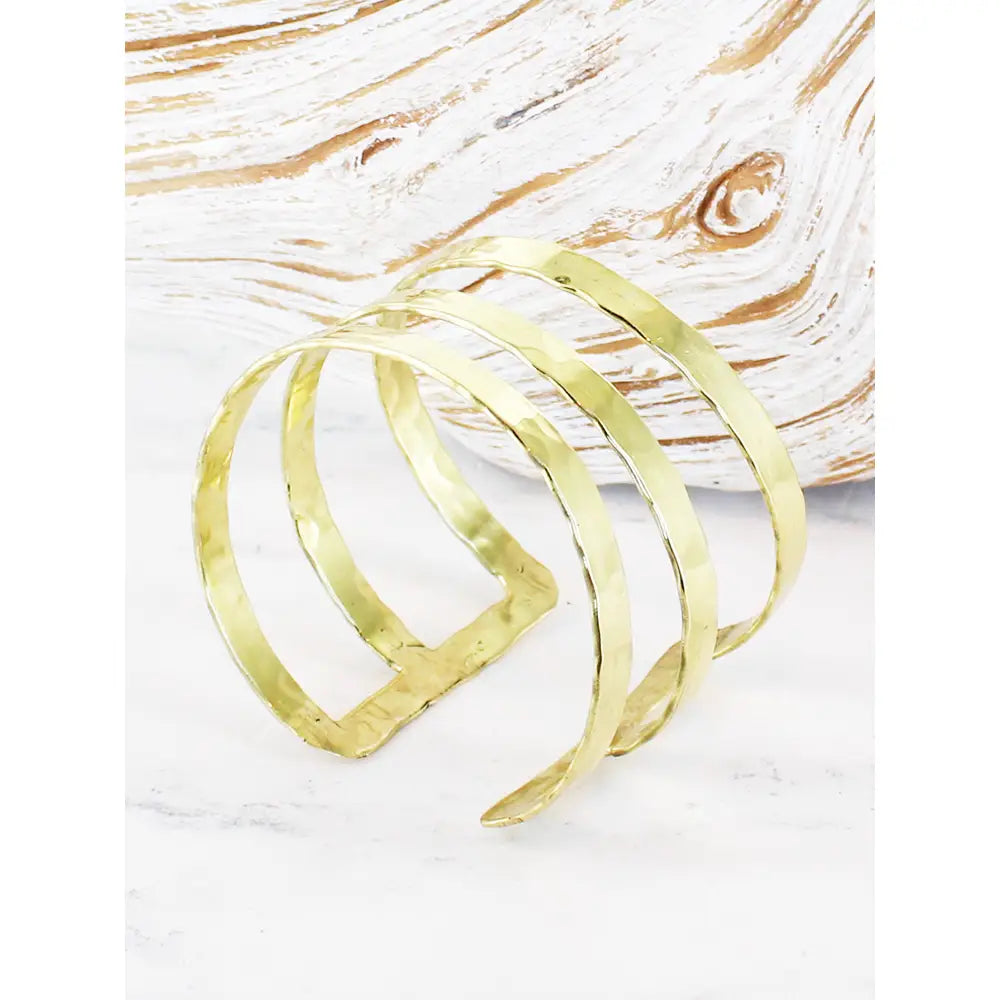 Beaten triple cuff